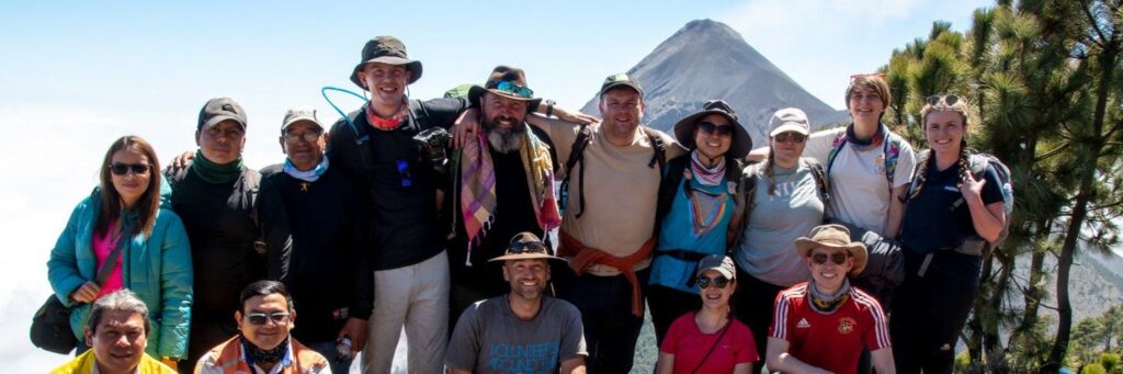The Bristol Volcanology Group and Guatemalan colleagues in front of Fuego volcano, Guatemala
