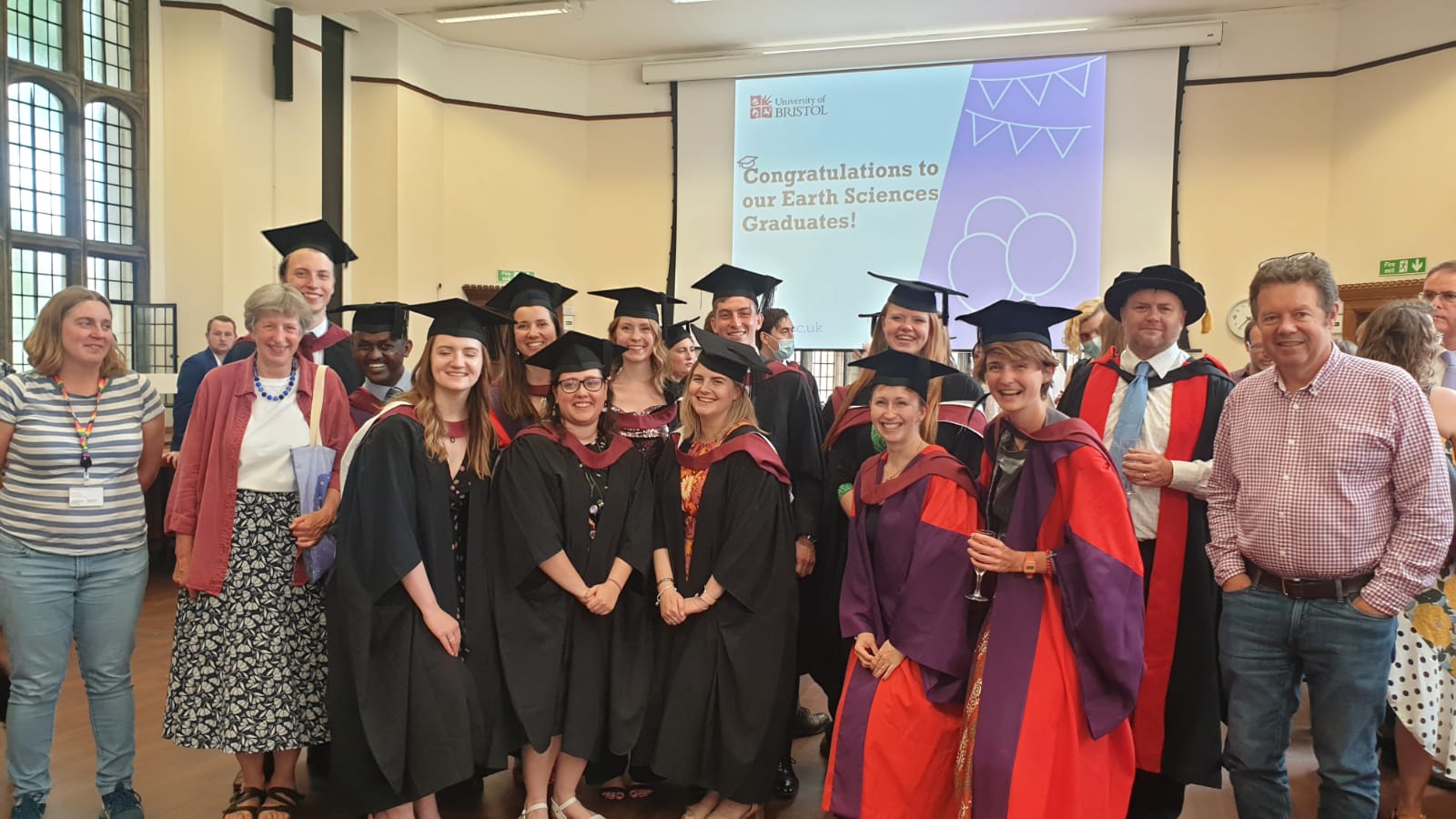 A group of graduands of the MSc Volcanology course with several PhD graduands at the University of Bristol's School of Earth Sciences 
